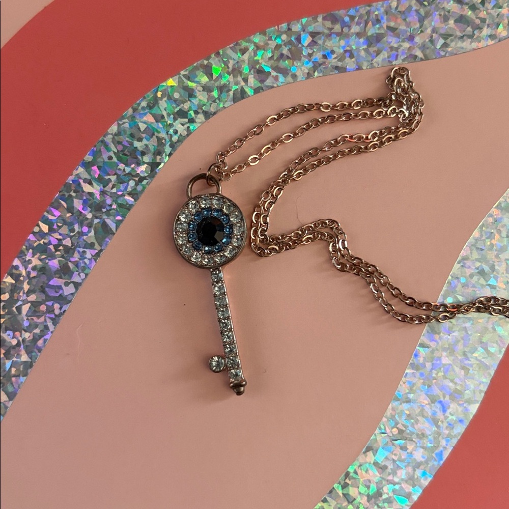 Elegant Key Pendant Necklace with Blue Gem